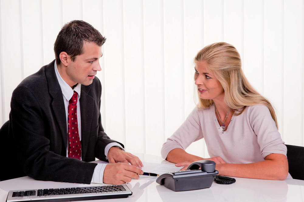 women signing a contract 